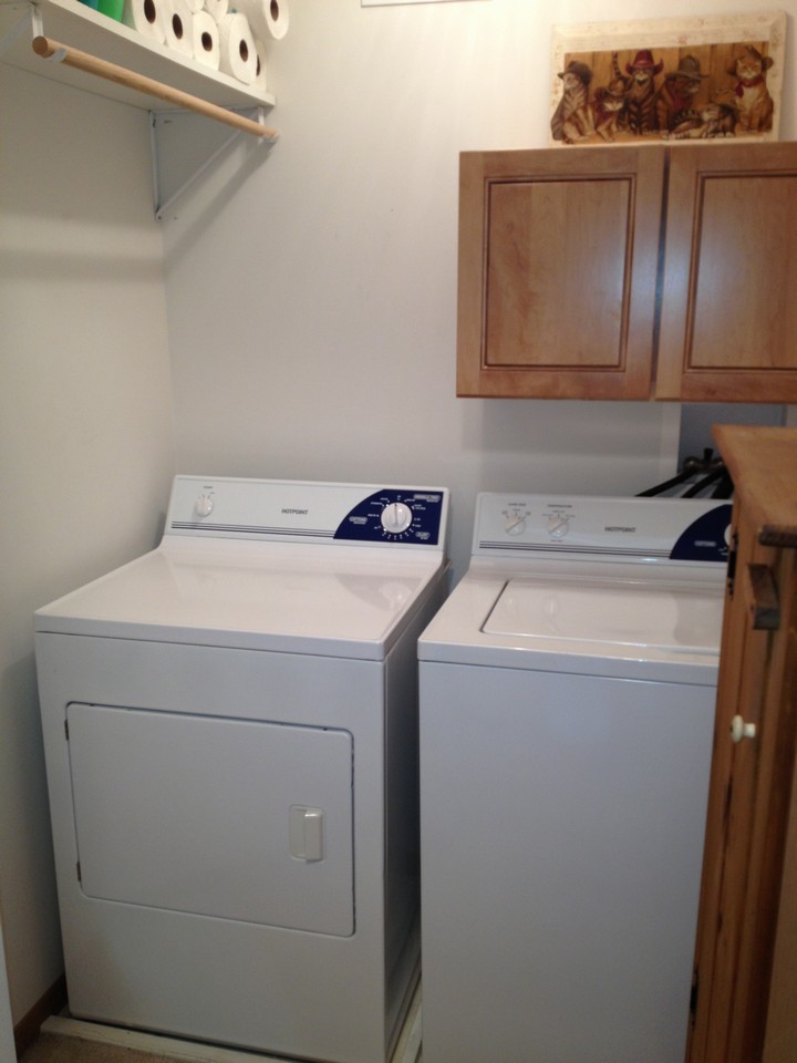upper level laundry with room for hanging clothes.