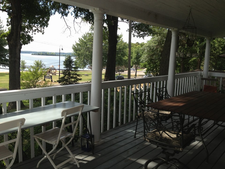 huge front porch overlooking lake enjoy front row seats from your own porch for lake minnetonka fireworks.