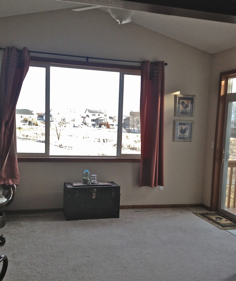 four season porch with beautiful views of the preserve complete with a grill deck.