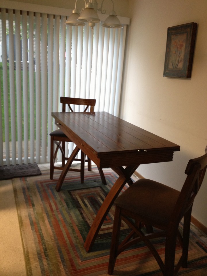 separate dining with sliding door to a private patio.