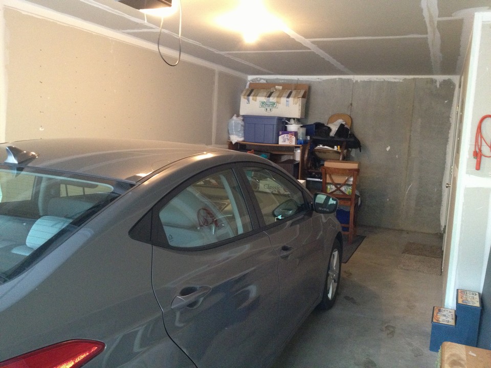 xlarge 1 car garage. big enough for storage, motorcycle, and/or workshop. there is also a utility room with extra storage space.